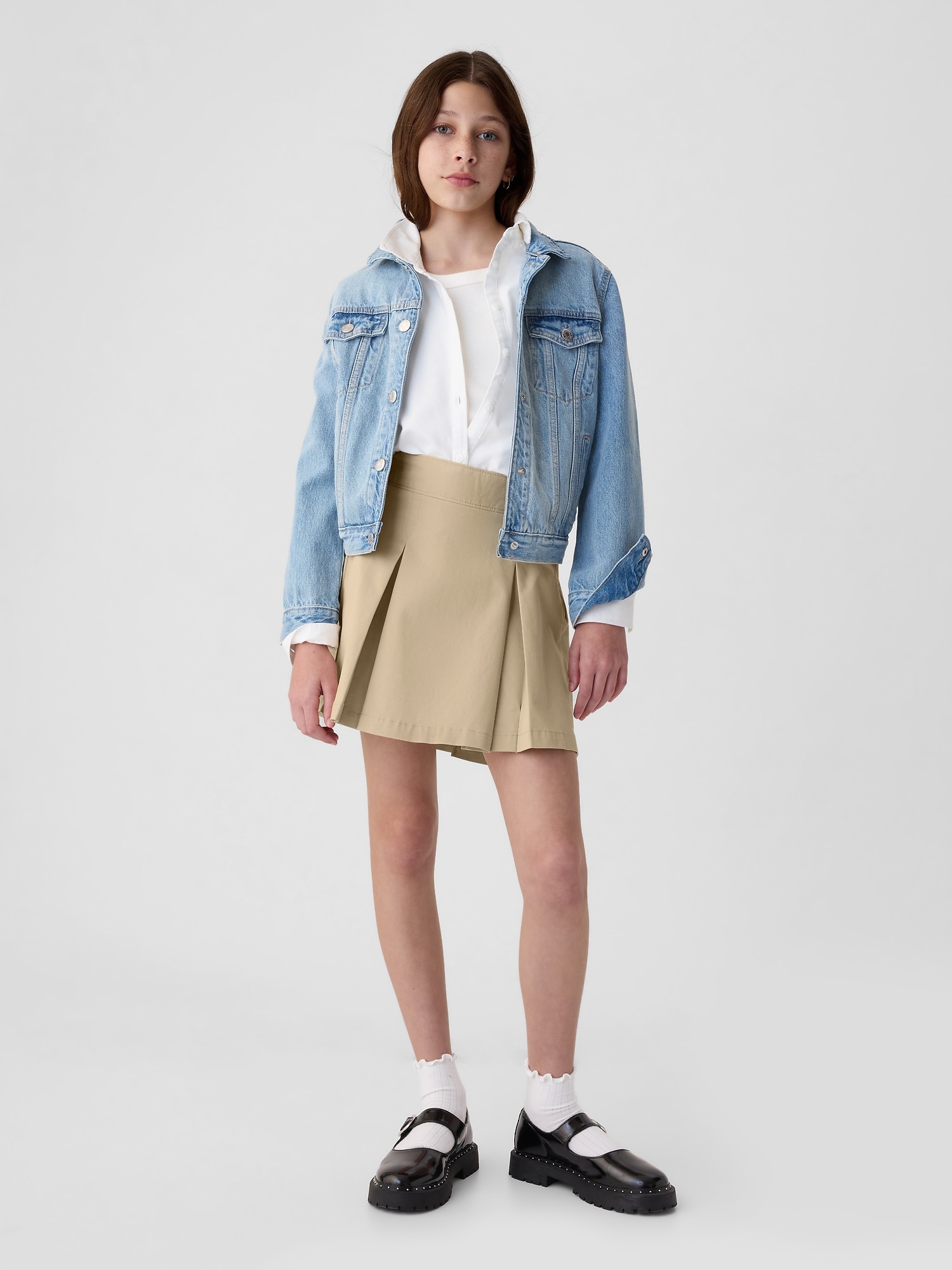 JUPE-SHORT KAKI D'UNIFORME À PLIS POUR ENFANT