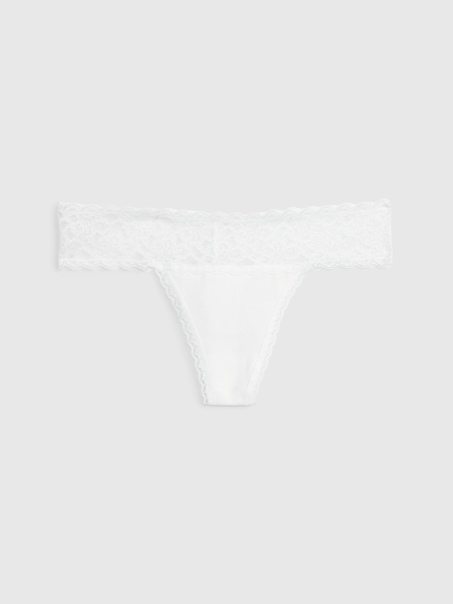 TANGA EN COTON BIOLOGIQUE EXTENSIBLE AVEC BORDURE EN DENTELLE