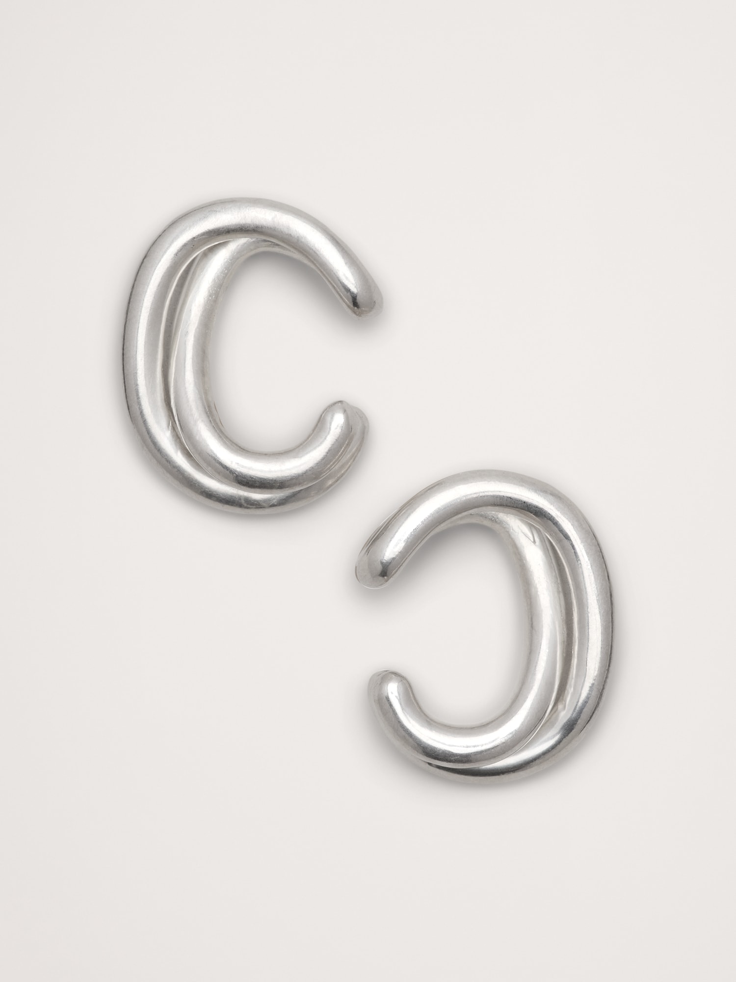 MANCHETTES D'OREILLE NOUÉES SANS TIGE