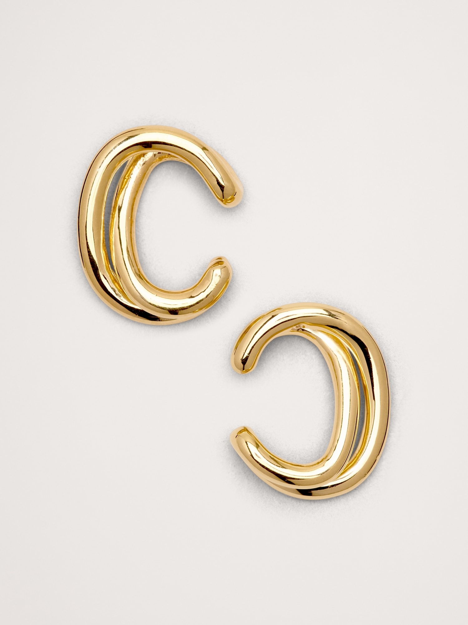 MANCHETTES D'OREILLE NOUÉES SANS TIGE