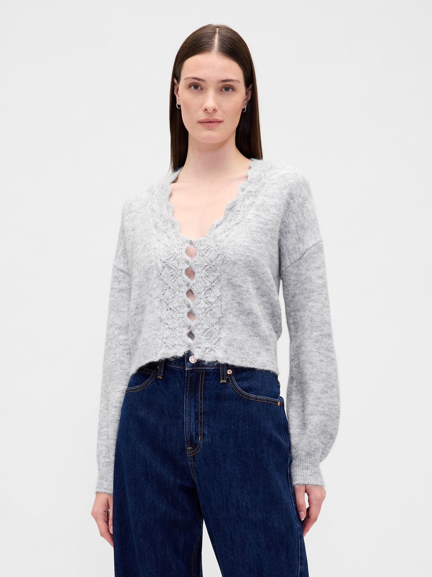 CARDIGAN COURT FESTONNÉ EN TRICOT POINTELLE PELUCHEUX