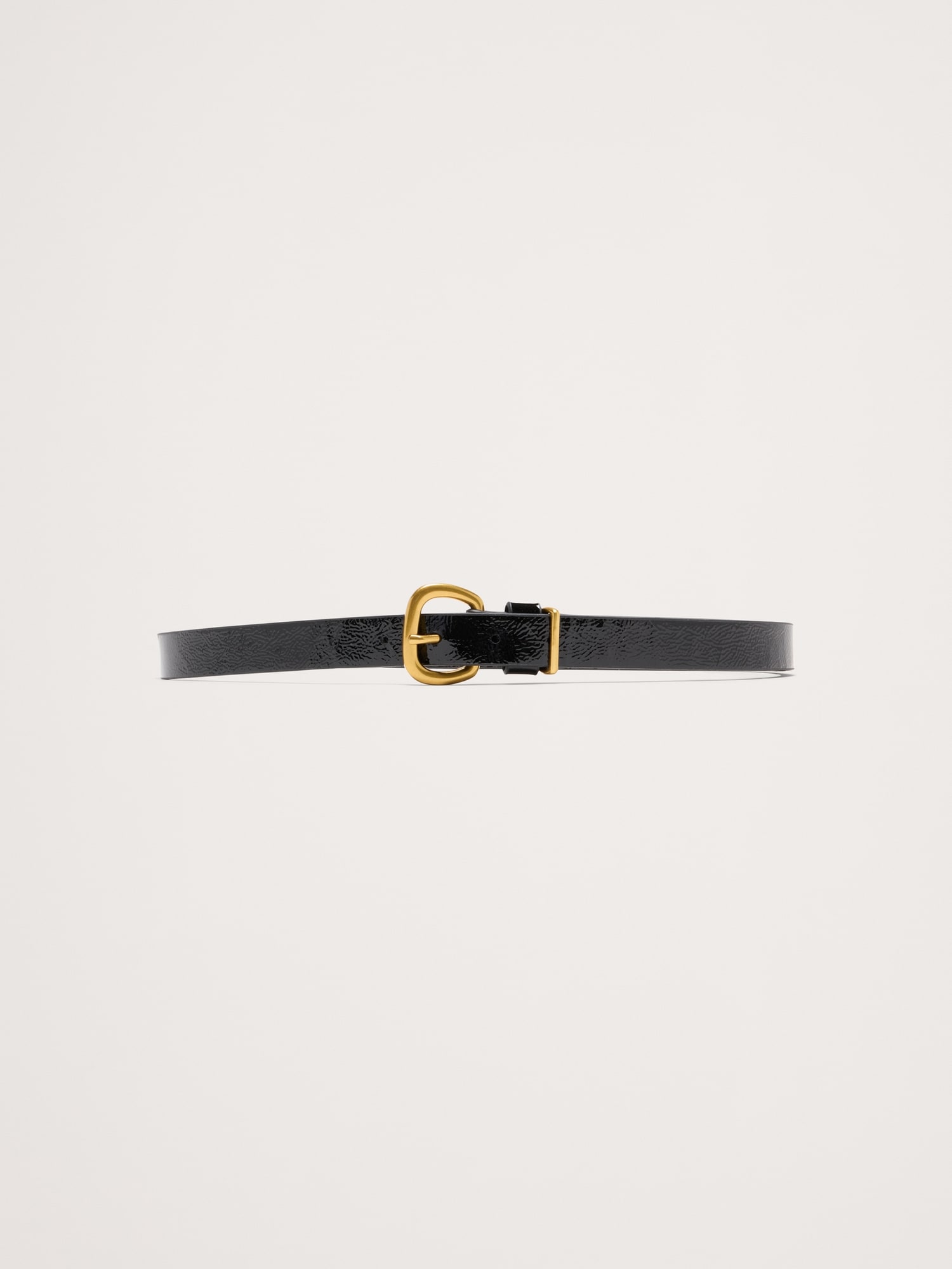 CEINTURE NOUÉE EN CUIR VERNI