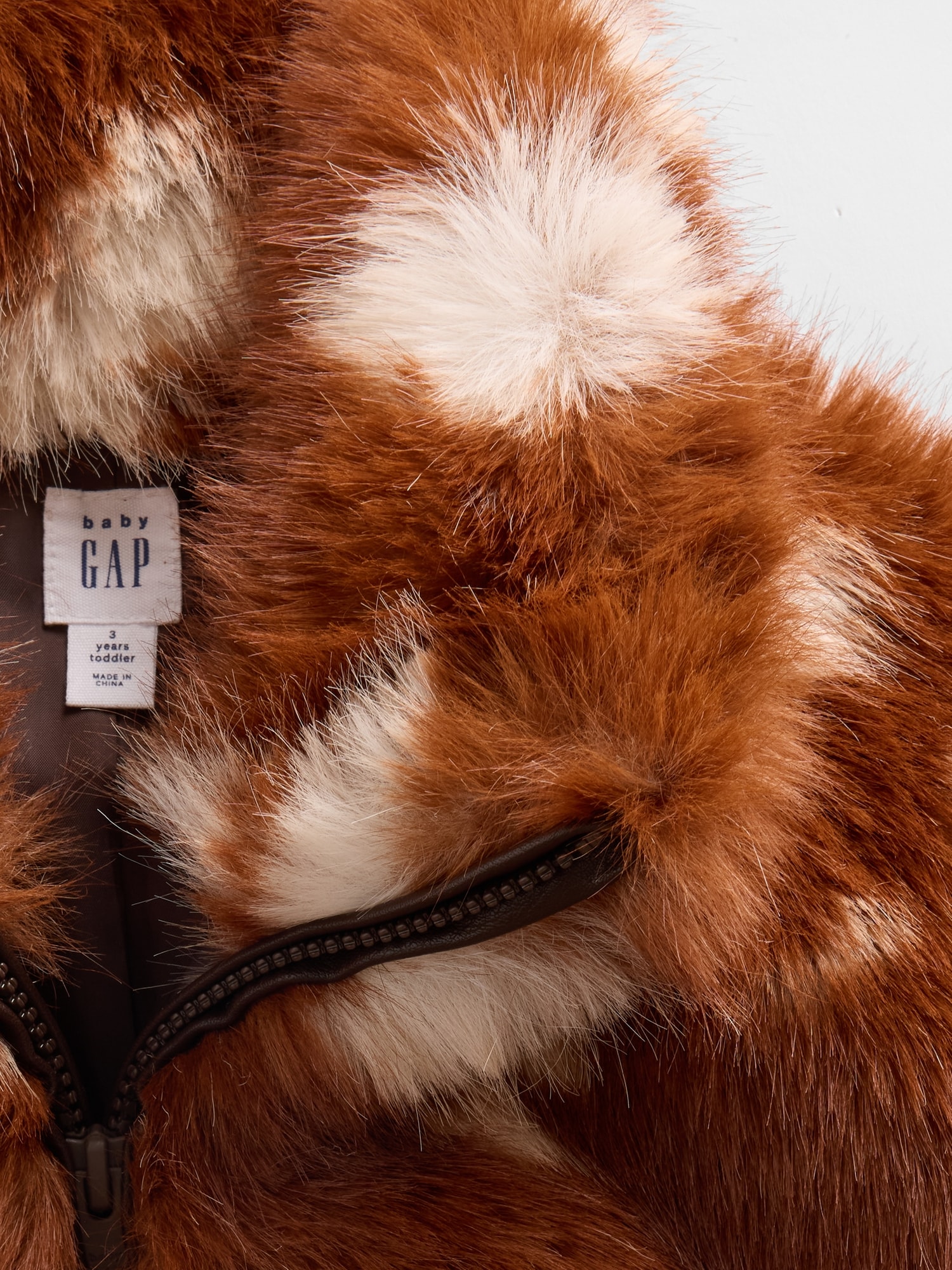 GAP×Sandy Liang ヴィーガンファーのハーフジッププルオーバー Gap x Sandy Liang Women's Spotted Vegan Fur Half-Zip