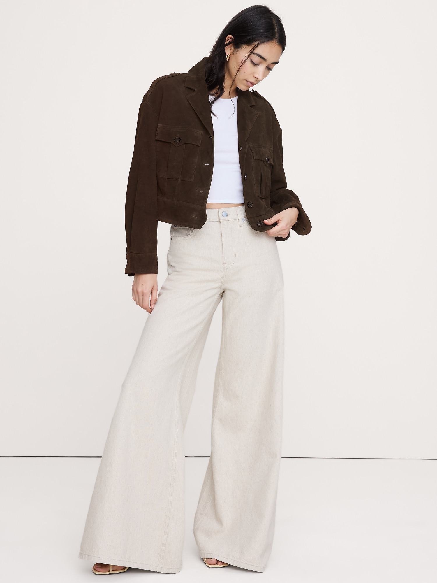 VESTE EN SUÈDE À DEUX POCHES RETOUR AUX ARCHIVES