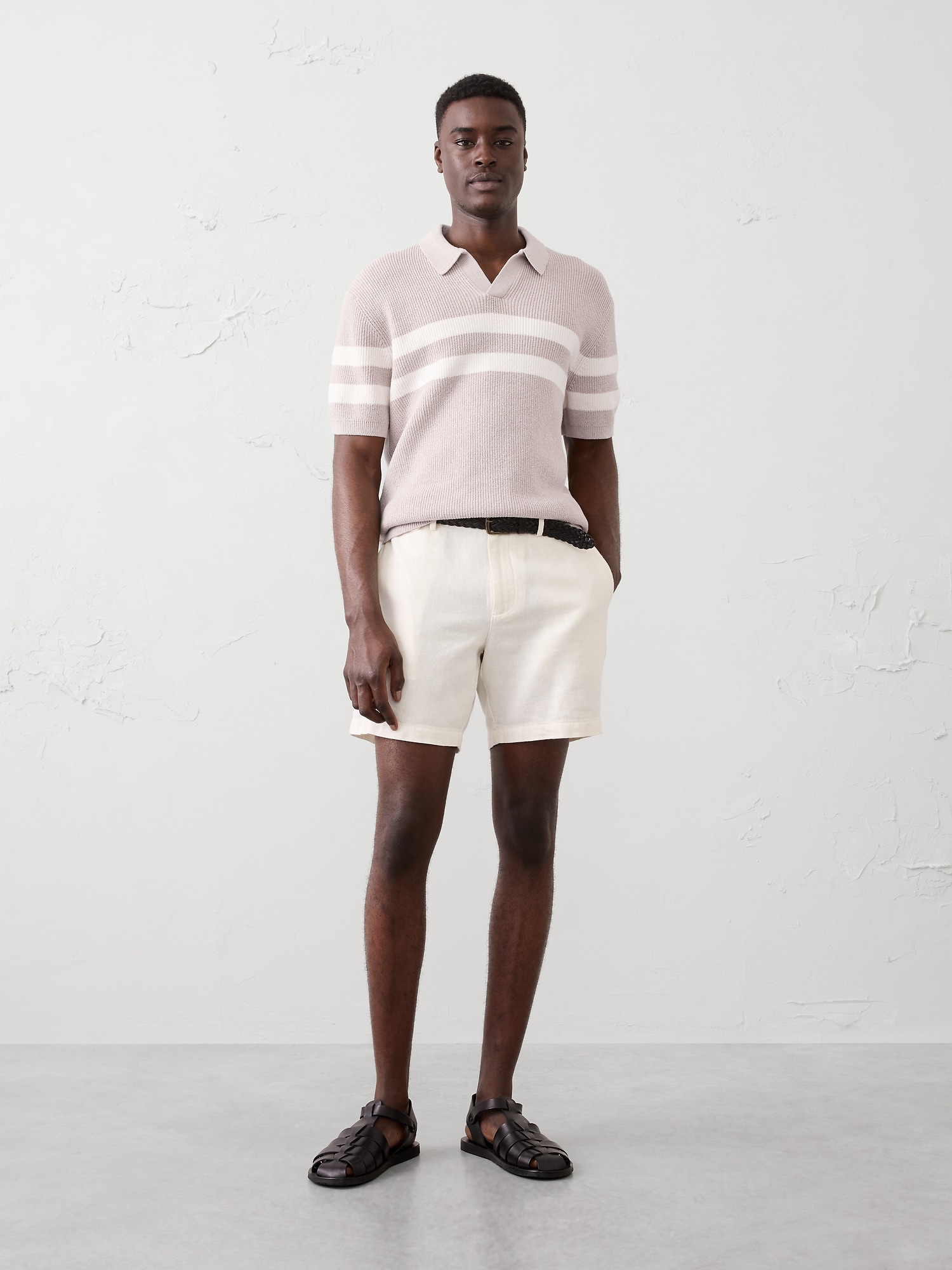 POLO RAYÉ À COL TRICOTEUSE.