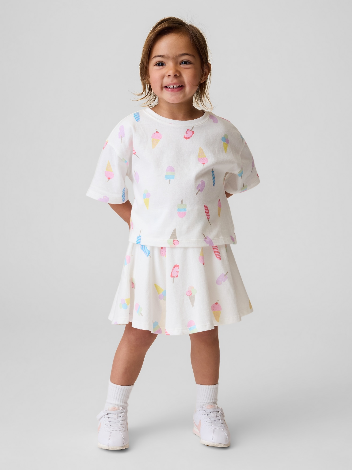 ENSEMBLE AVEC JUPE-SHORT POUR BÉBÉ ET TOUTE-PETITE