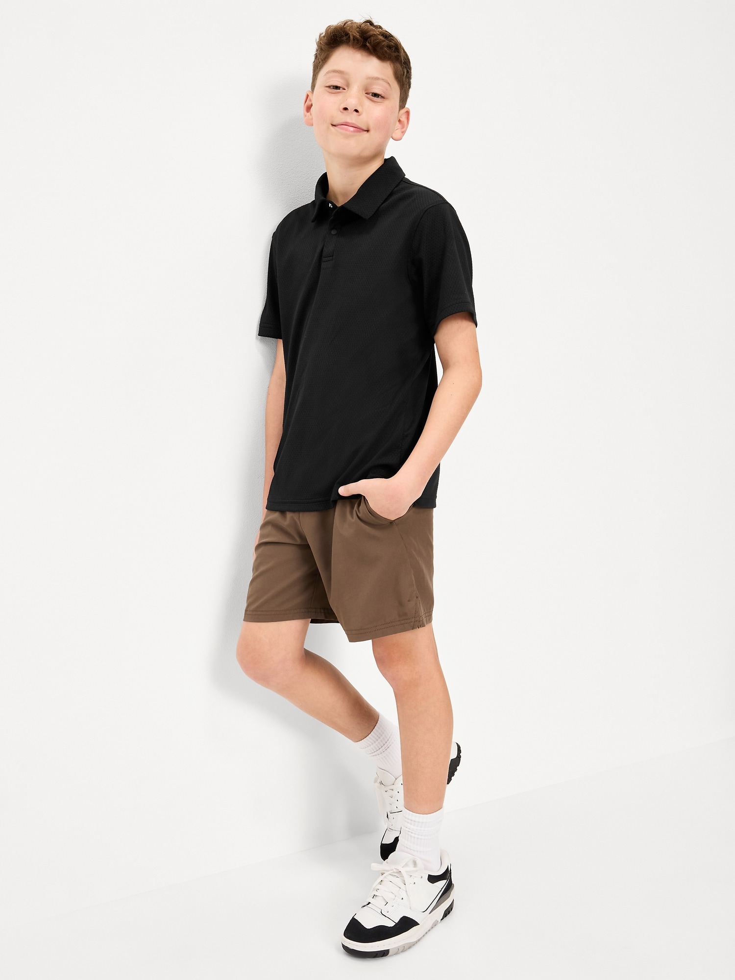 POLO TEXTURÉ À POCHE ET À MANCHES COURTES POUR GARÇON