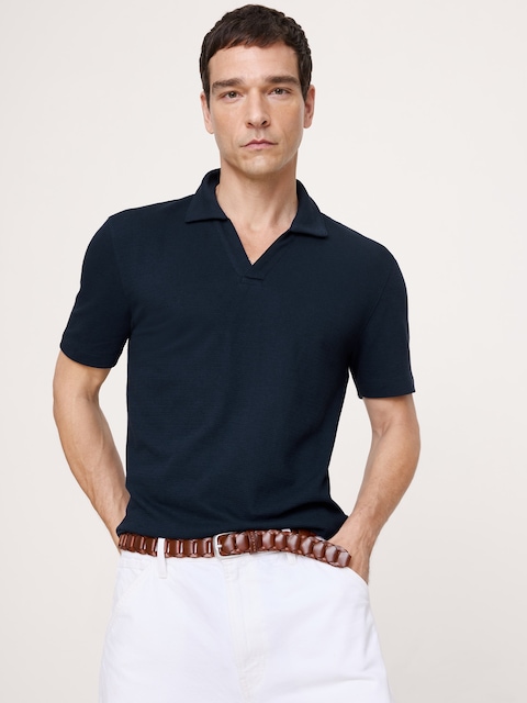 HAUT À COL POLO TRICOTEUSE À MAILLES
