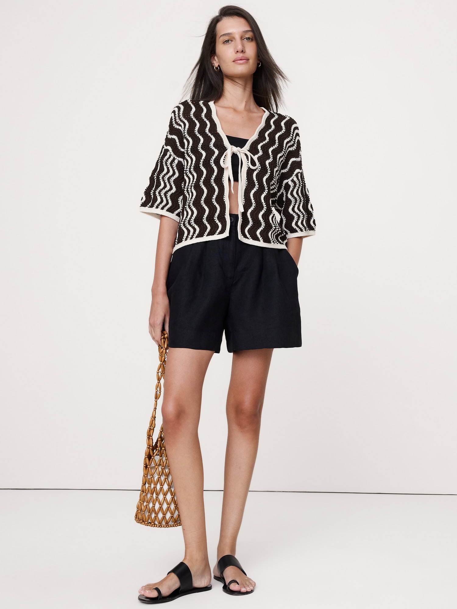 CARDIGAN FESTONNÉ EN COTON RAYÉ NOUÉ SUR LE DEVANT