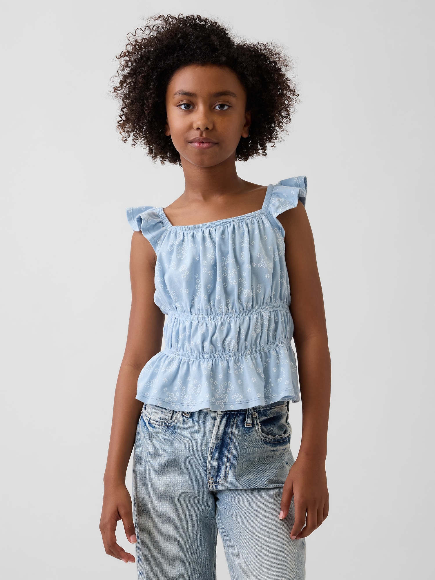 HAUT SMOCKÉ À BASQUE ET À MANCHES FLOTTANTES POUR ENFANT