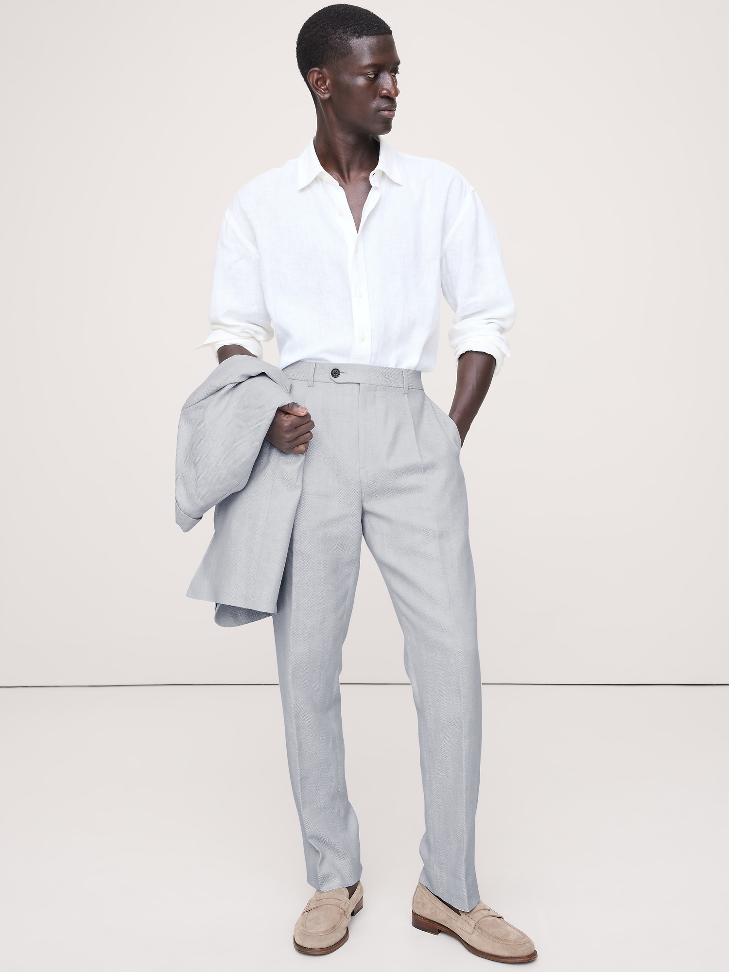 PANTALON DE COMPLET EN LIN ET LAINE MÉRINOS À MOTIF DE CHEVRONS, COUPE ÉTROITE CINTRÉE