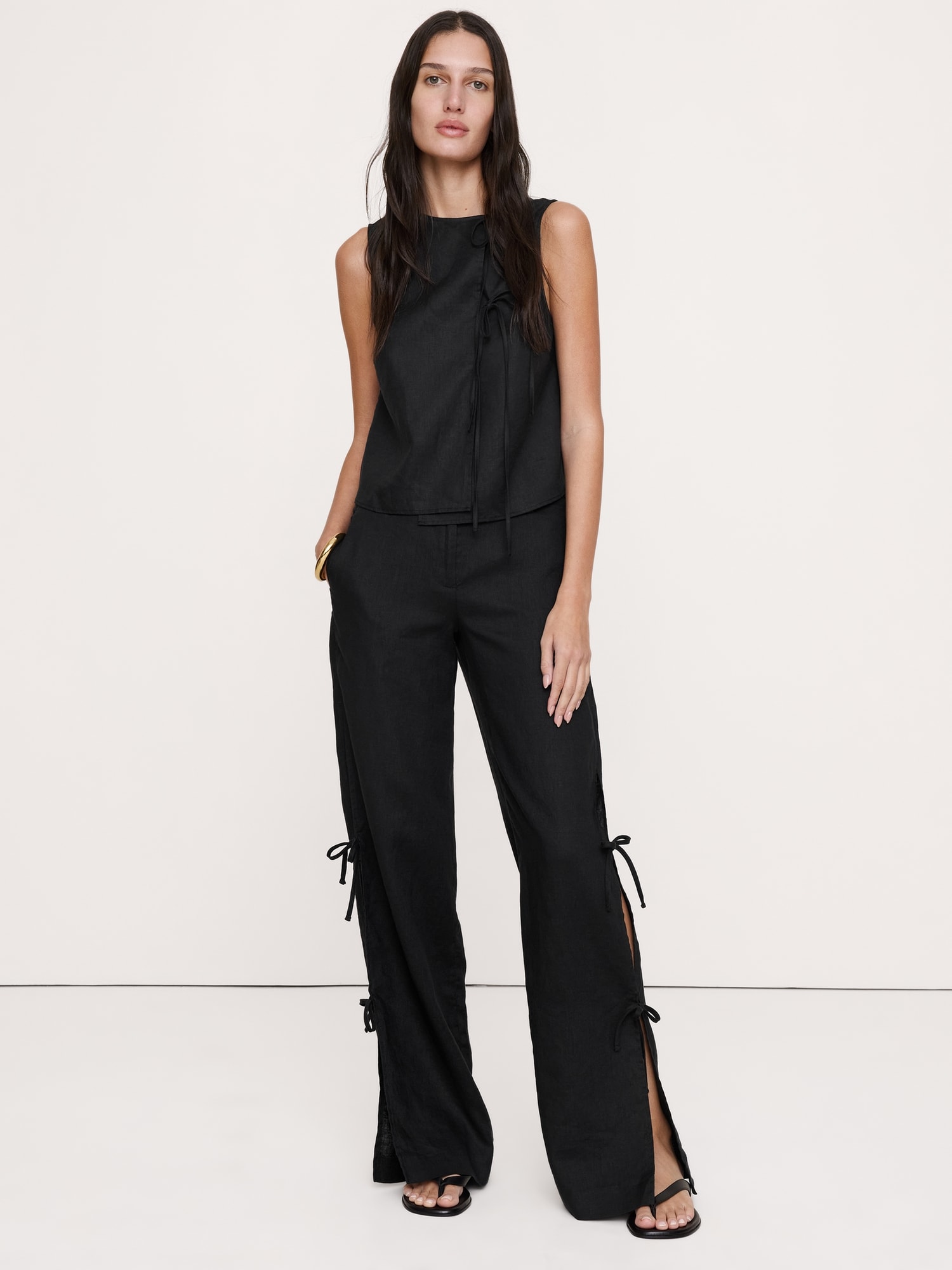 PANTALON EN LIN À JAMBE LARGE ET NOUÉ SUR LE CÔTÉ THE STUDIO