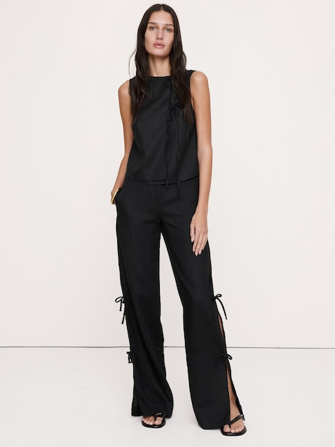 PANTALON EN LIN À JAMBE LARGE ET NOUÉ SUR LE CÔTÉ THE STUDIO