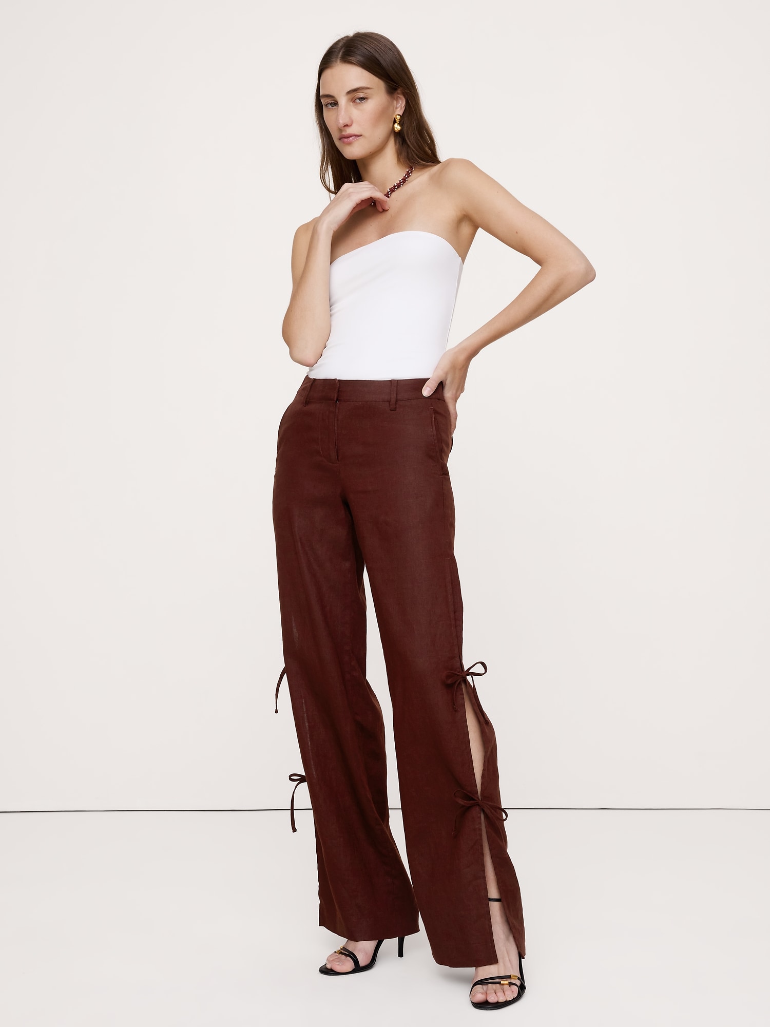 PANTALON EN LIN À JAMBE LARGE ET NOUÉ SUR LE CÔTÉ THE STUDIO