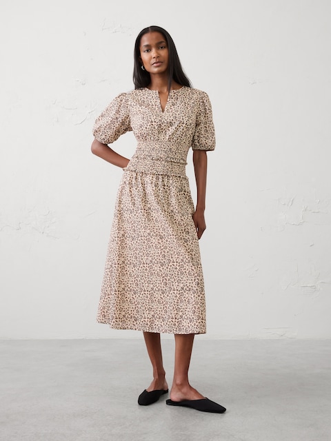 ROBE MI-LONGUE À TAILLE SMOCKÉE ET À MANCHES BOUFFANTES